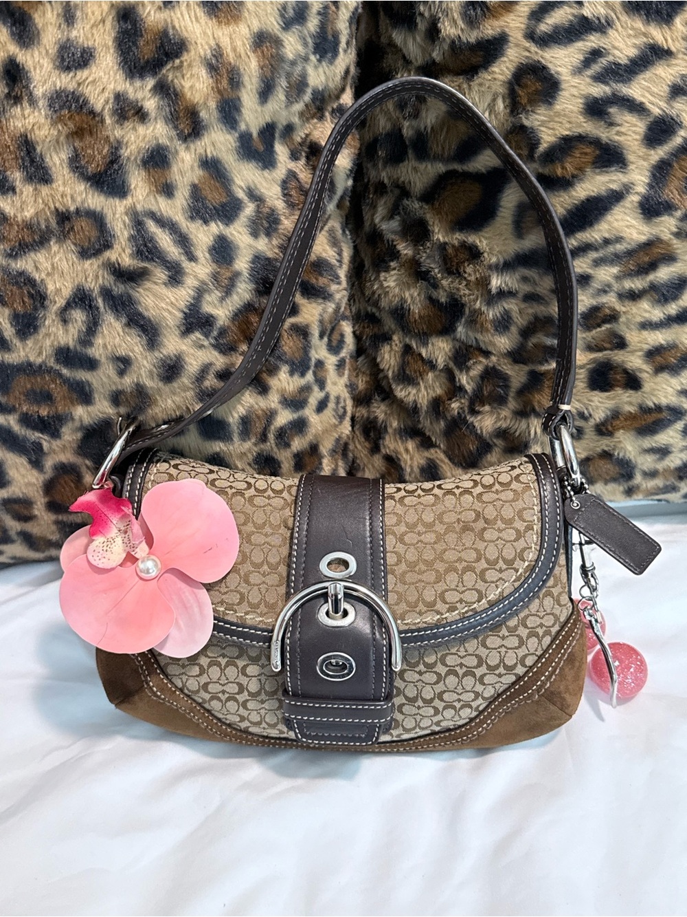 Coach Brown Signature Canvas Shoulder Bag with Pink Flower Charm